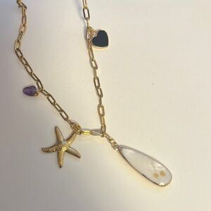 Gold and Purple Necklace with Elegant Design